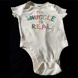 ‘The Snuggle Is Real’ onsie super adorable